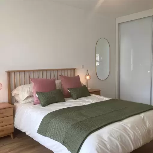 Master Bedroom with large double bed and built in wardrobe