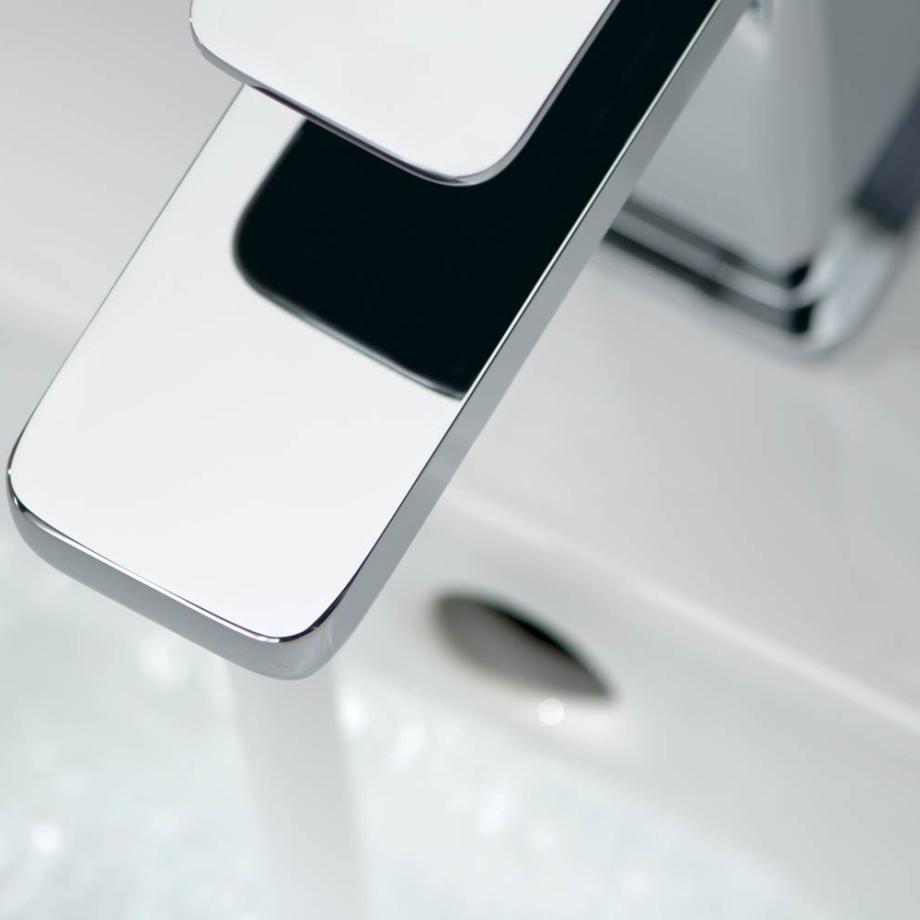 Close up of modern chrome bathroom tap